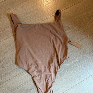 Skims nude high leg bodysuit